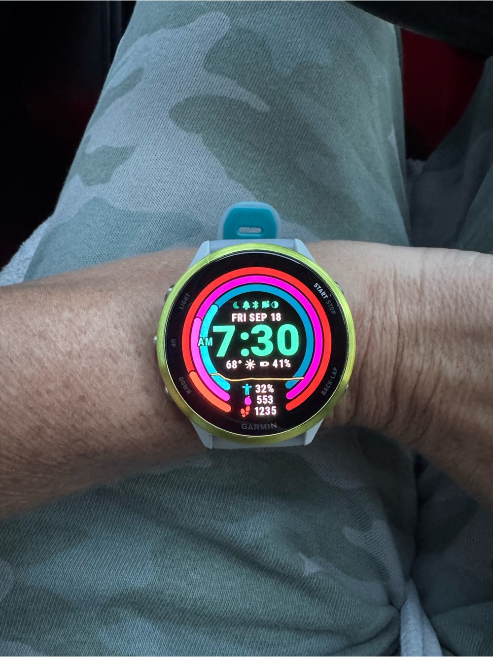 Garmin Forerunner 570 47mm Smartwatch with Teal Band and Yellow Bezel